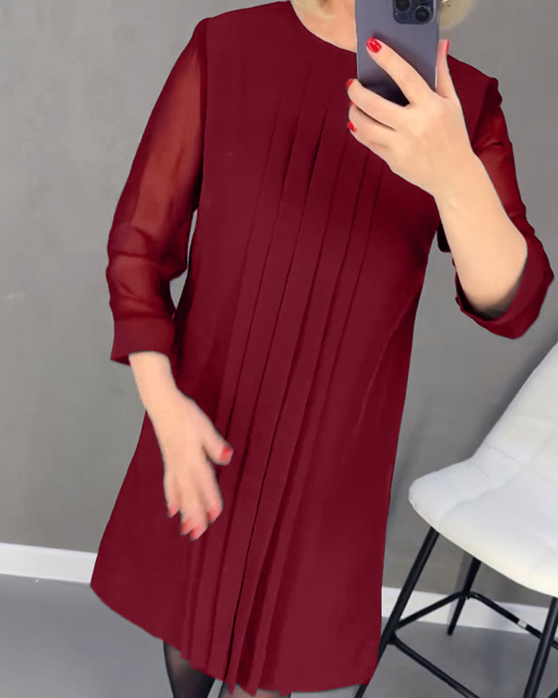 Elegant höstskiftklänning med mesh-detaljer – Gabrielle