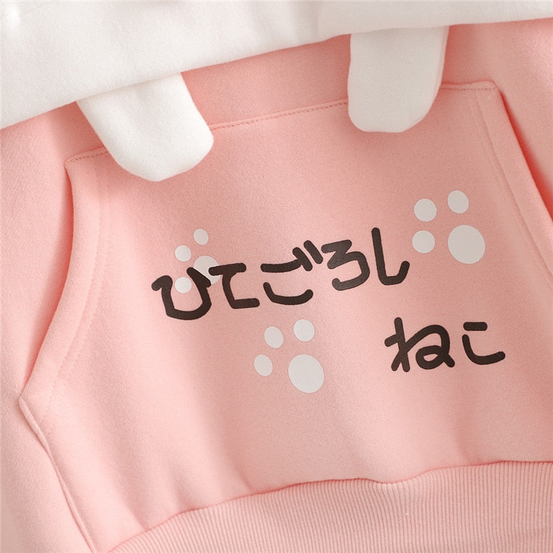 Rosa Kapuzenpullover mit japanischem Schriftzug und Katzenpfoten, Baumwolle, Damenmode.