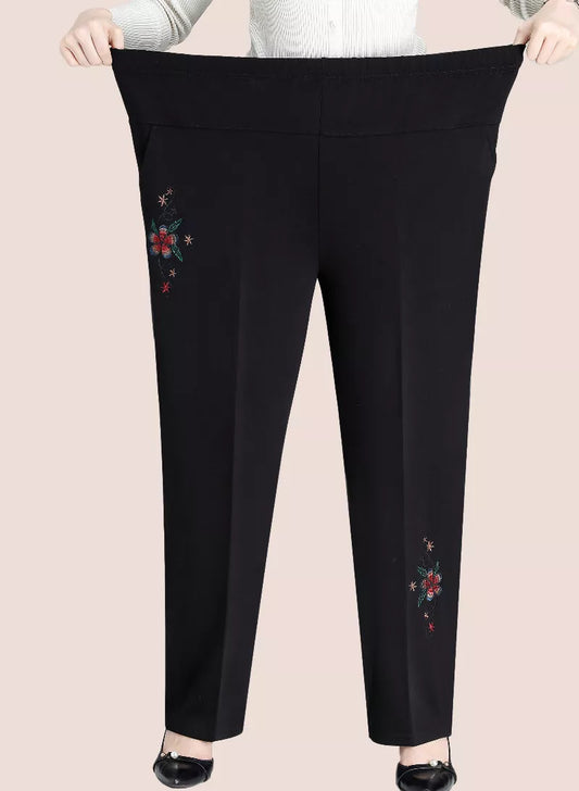 Schwarze Damenhose mit Blumenstickerei, elastischer Bund, elegant, bequem, modisch.