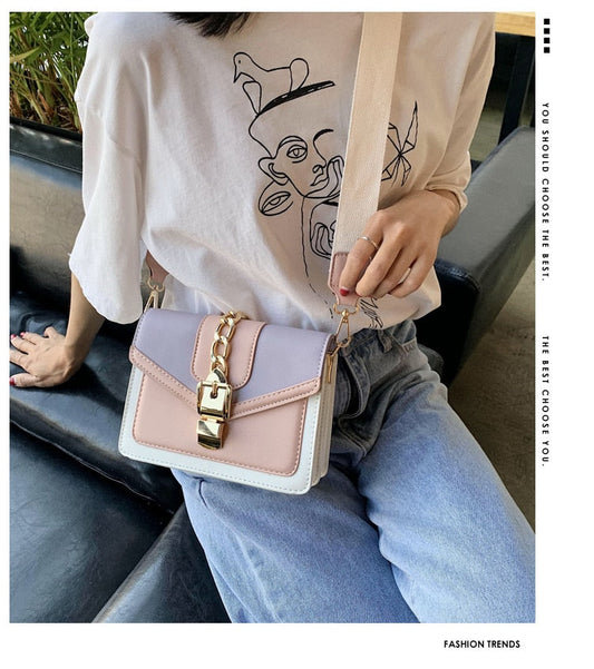 Damenhandtasche rosa-lila, Leder, goldene Kette, Umhängetasche, modisch, elegant.