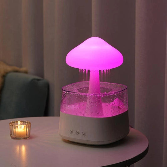 Pilzförmiger Luftbefeuchter mit rosa LED-Licht auf Tisch, moderne Wohnkultur.