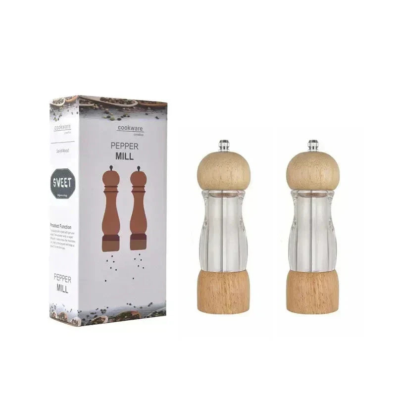 Zwei transparente Pfeffermühlen aus Holz und Acryl mit Verpackung, Küchengerät.