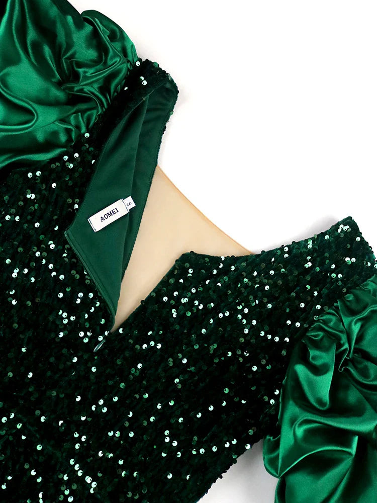 Grünes Paillettenkleid mit Puffärmeln, elegantes Abendkleid, festliche Damenmode.