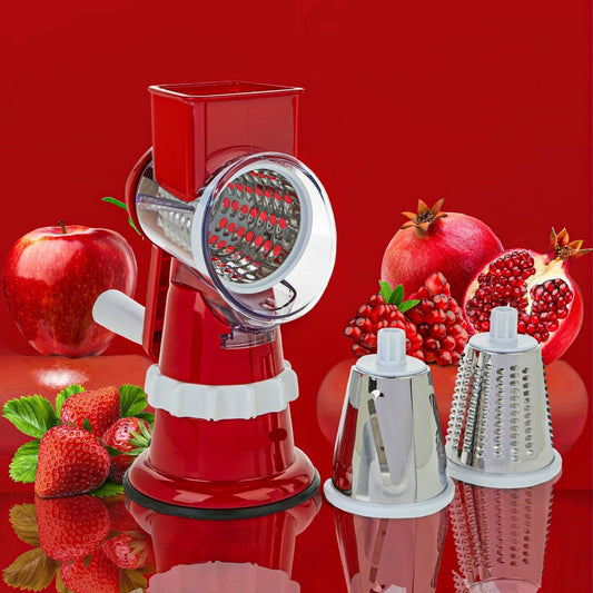 Roter manueller Gemüseschneider mit Edelstahlklingen, ideal für Obst und Gemüse, auf rotem Hintergrund.