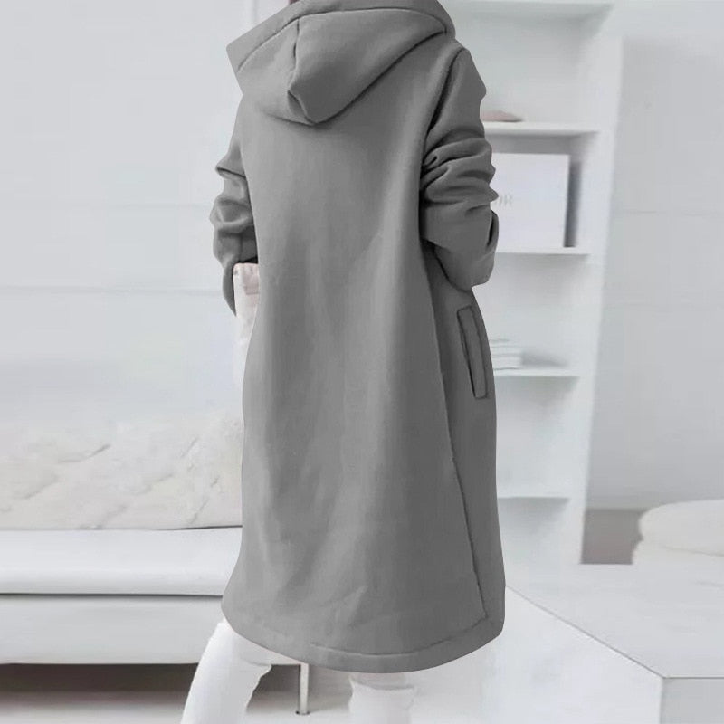 Damen Kapuzenmantel grau, lang, warm, Wintermode, lässig, Taschen, gemütlich, stilvoll.