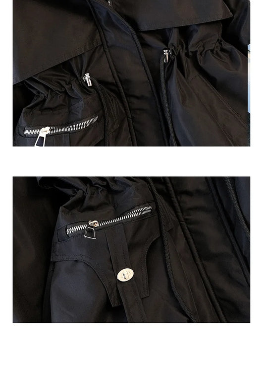 Schwarze Jacke mit Reißverschlusstaschen, modisch, funktional, Outdoor-Bekleidung.