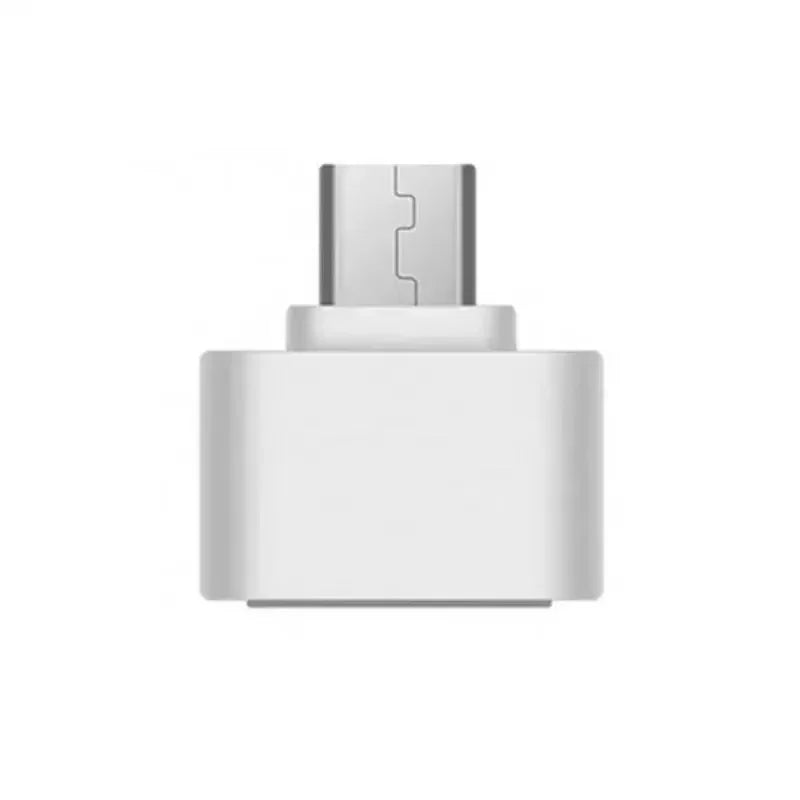 Liten vit adapter med mikro-USB-kontakt i ena änden och USB-uttag i den andra 7