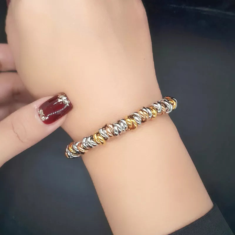 Damenarmband aus Edelstahl, dreifarbig, modisch, elegant, Schmuck für Frauen.