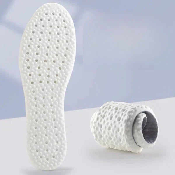 Weiße orthopädische Einlegesohle, atmungsaktiv, rutschfest, für bequeme Schuhe.