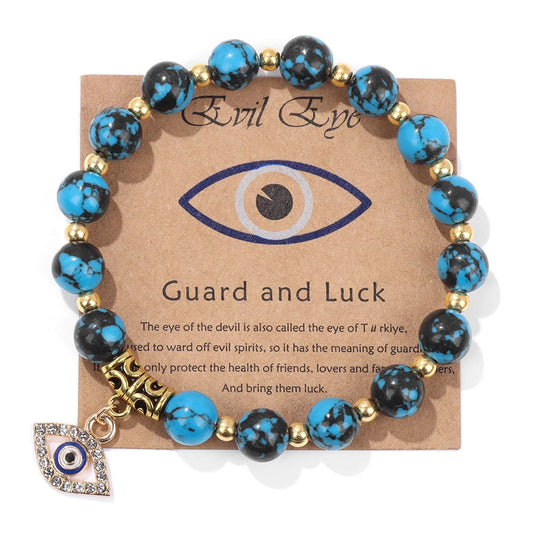 Blau-türkises Armband mit goldenen Perlen und Nazar-Anhänger, Schutz und Glück.