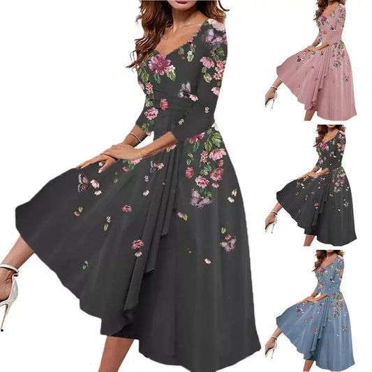 Damenkleid mit Blumenmuster, langärmelig, in Schwarz, Rosa und Blau, knielang, elegant.