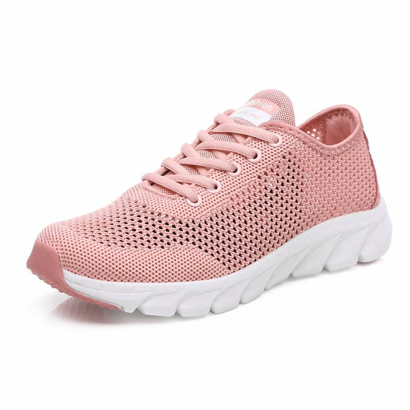 Rosa Damen-Sneaker aus Mesh, atmungsaktiv, mit weißer Sohle, ideal für Sport und Freizeit.