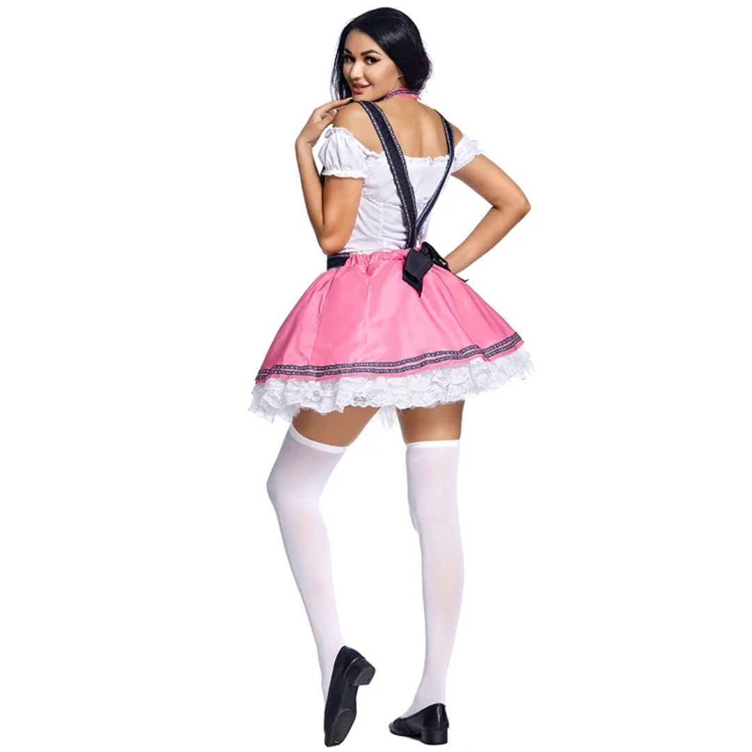 Frau in rosa Dirndl mit weißen Strümpfen, traditionelles Oktoberfest-Kostüm, Rückansicht.