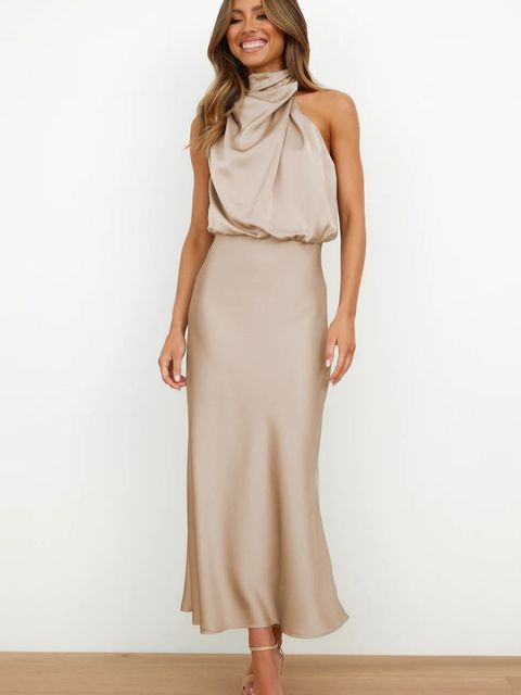 Elegantes, ärmelloses Abendkleid in Beige, lang, rückenfrei, ideal für Partys und Hochzeiten.