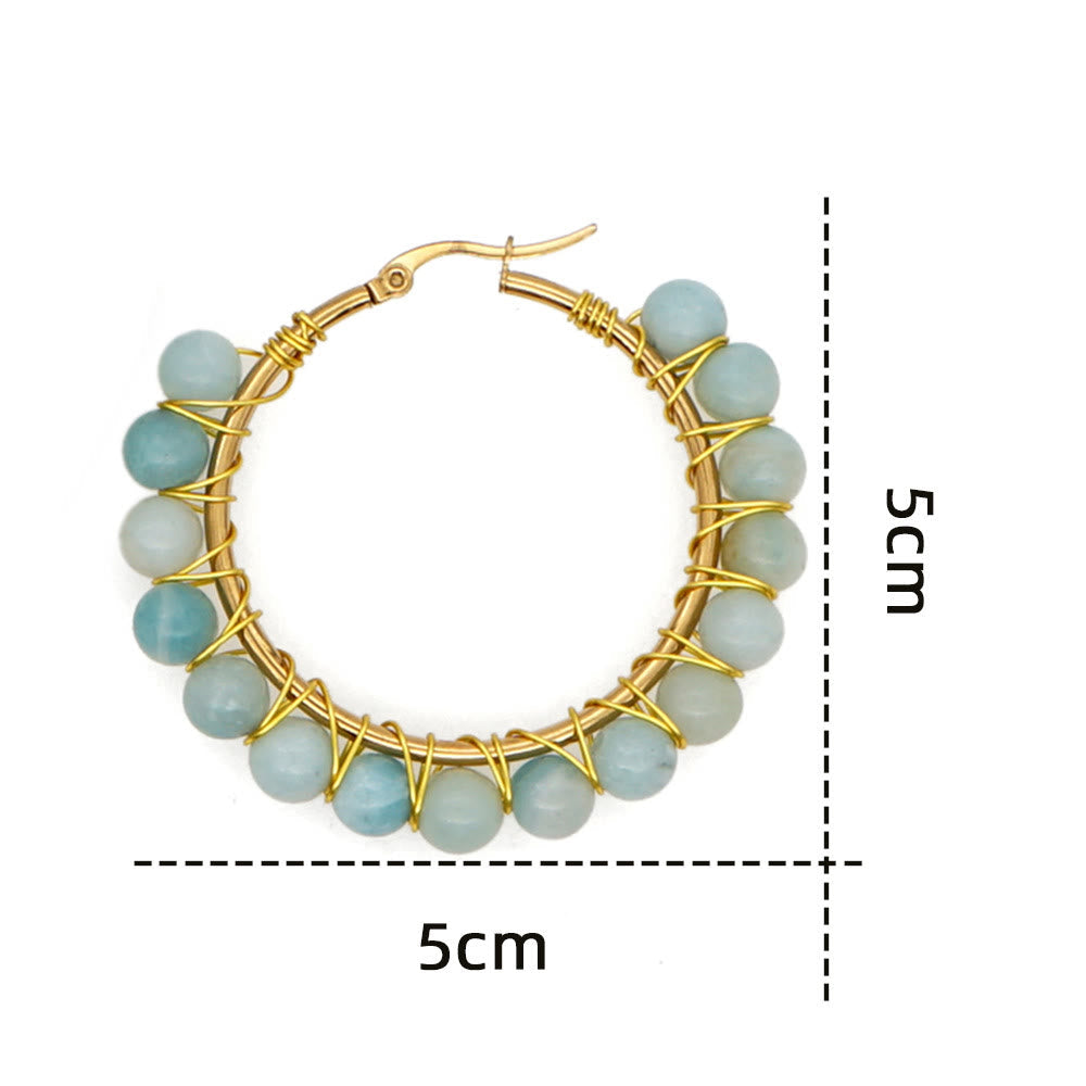 Goldener Ohrring mit blauen Perlen, 5cm Durchmesser, handgefertigter Schmuck, modisch.