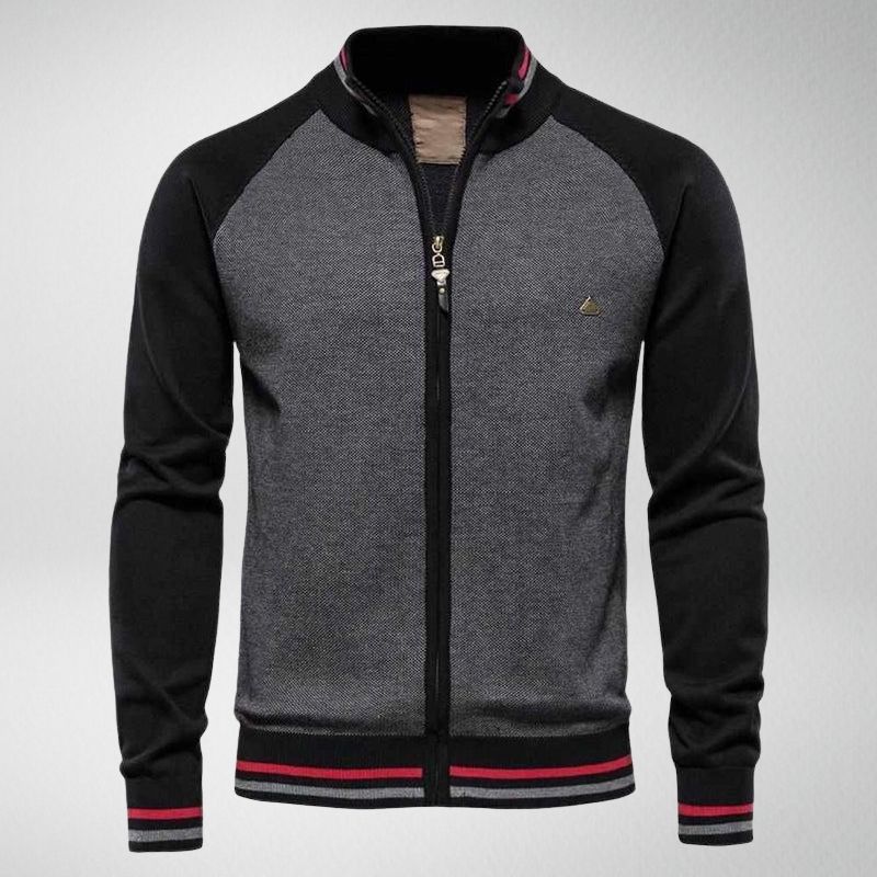 Graue Herrenjacke mit schwarzem Kragen, Reißverschluss, rot-schwarzen Streifen, sportlich.