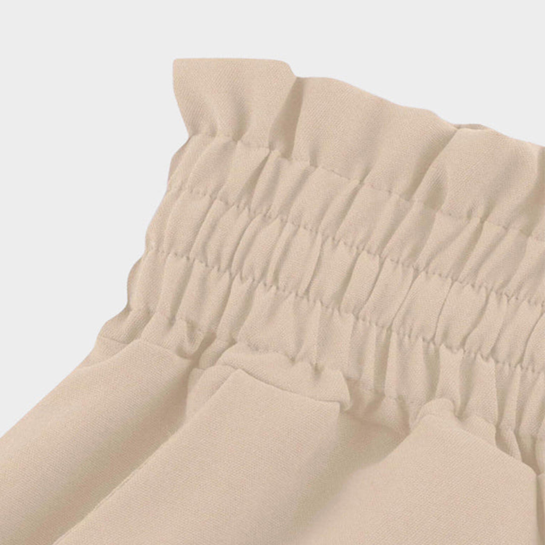Beige Damenhose mit elastischem Bund, Rüschen, elegantes Design, bequeme Passform.