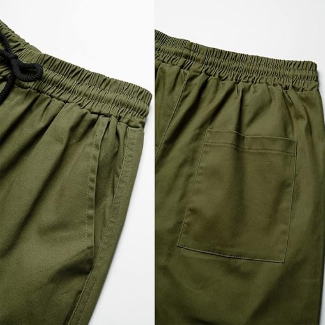 Grüne Jogginghose aus Baumwolle mit elastischem Bund und Tasche, Herrenmode, Freizeitkleidung.