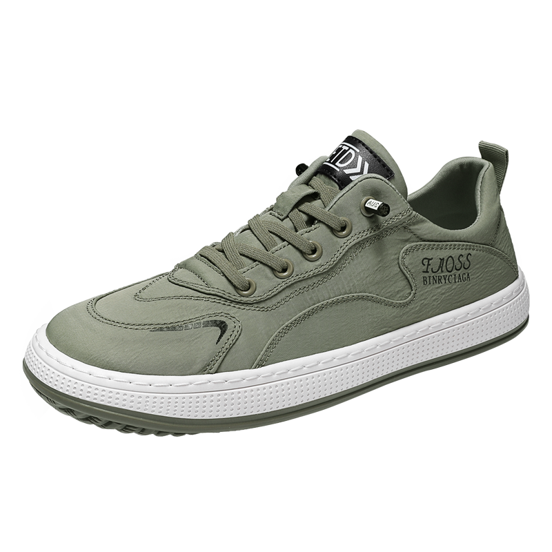Grüner Sneaker für Herren, sportlich, bequem, mit weißer Sohle, ideal für Freizeit und Alltag.