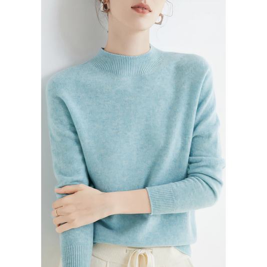 Damenpullover aus hellblauer Wolle, langärmelig, modisch, elegant, bequem.