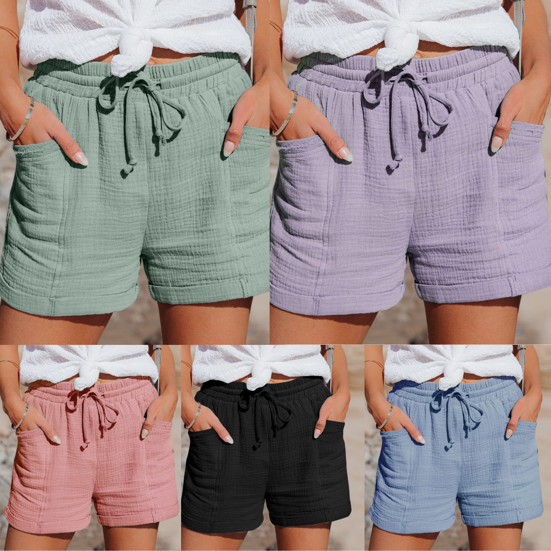 Fünf Damen-Shorts aus Baumwolle in Grün, Lila, Rosa, Schwarz und Blau mit Kordelzug.