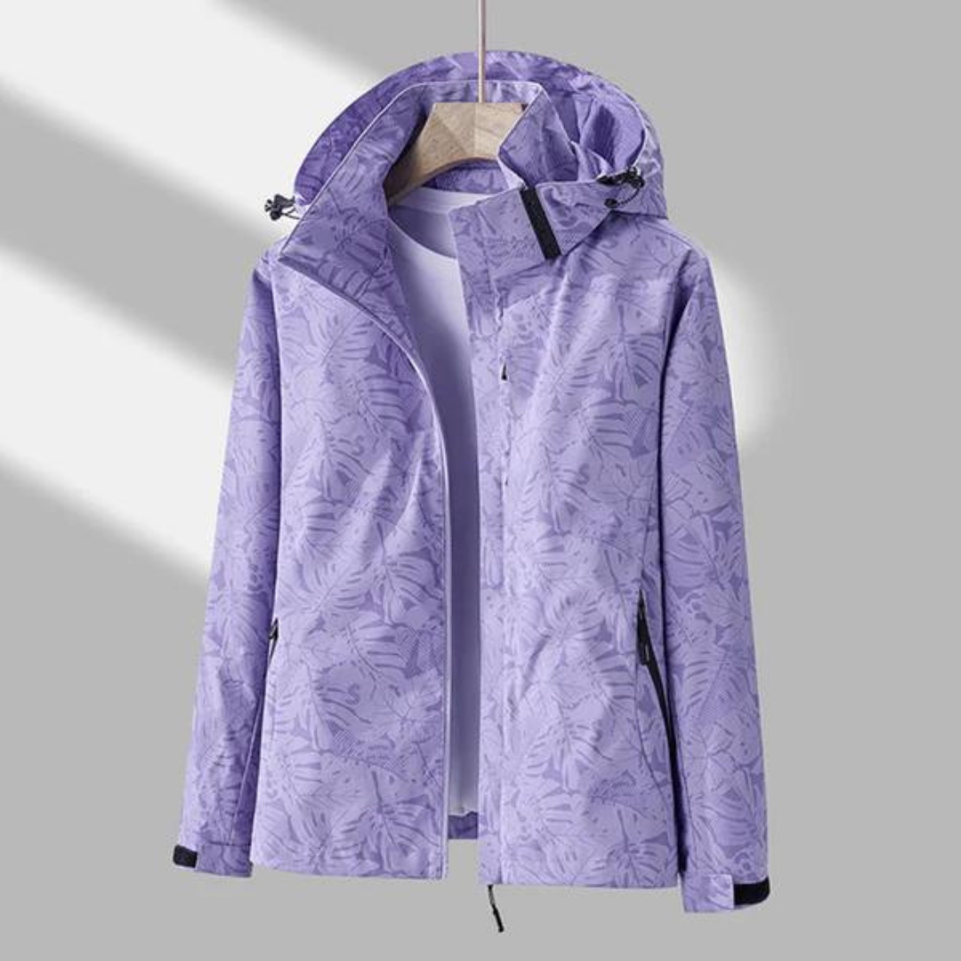 Lila Damen-Regenjacke mit Kapuze, floral gemustert, wasserdicht, Outdoor-Bekleidung.