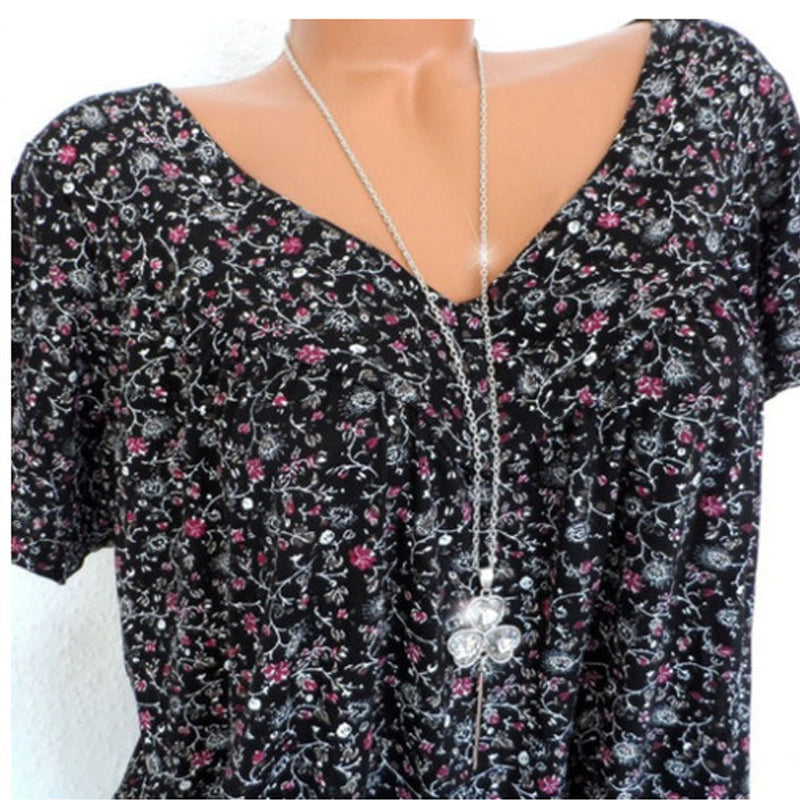 Schwarzes Damen V-Ausschnitt T-Shirt mit Blumenmuster, kurzarm, lässig, modisch.