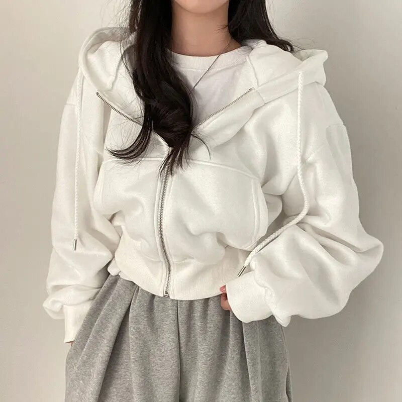 Damväst, kort modell med huva och oversized passform – Rinette