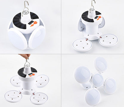 Weiße LED-Solarlampe mit faltbaren Panels, tragbar, für Camping und Outdoor-Aktivitäten.