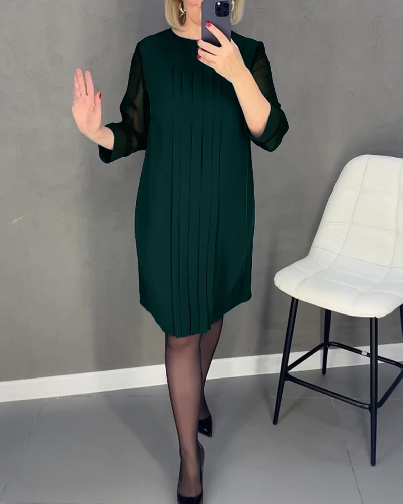 Elegant höstskiftklänning med mesh-detaljer – Gabrielle