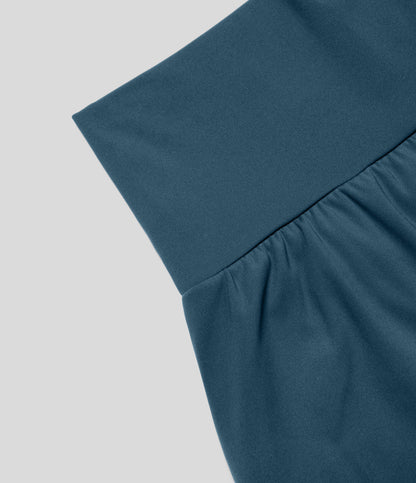 Andningsaktiva och snabbtorkande högmidjade träningsshorts för dam – Mirabella
