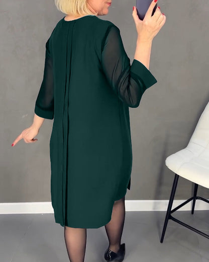 Elegant höstskiftklänning med mesh-detaljer – Gabrielle