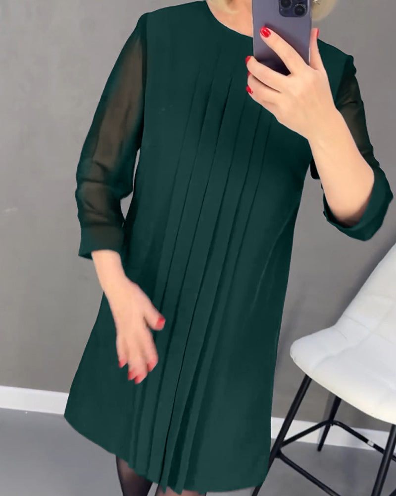 Elegant höstskiftklänning med mesh-detaljer – Gabrielle