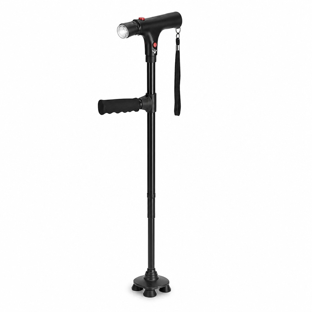 Svart gångkäpp på vit bakgrund med lampa i handtaget, extra sidohandtag, handlovsrem och fyra fötter i botten. 1