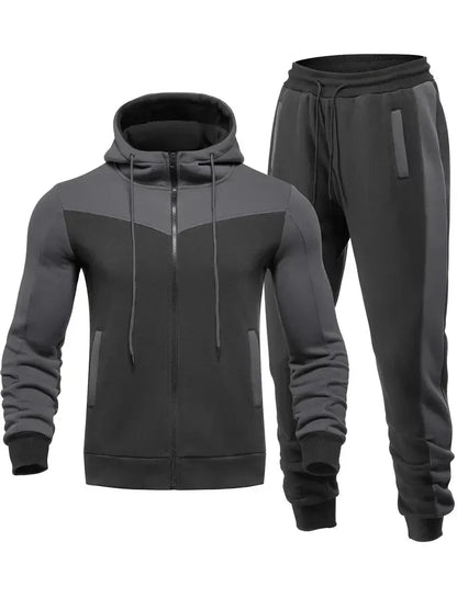 Dunkelgrauer Herren-Trainingsanzug mit Kapuze, Reißverschluss und Taschen, Sportbekleidung.