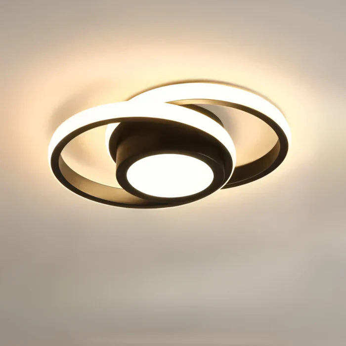 Moderne LED-Deckenleuchte, schwarz-weiß, energiesparend, für Wohnzimmerbeleuchtung.