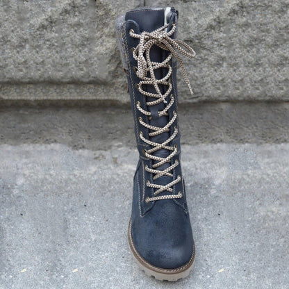 Damenstiefel aus Leder, dunkelblau, mit Schnürung, rutschfeste Sohle, modisch und robust.