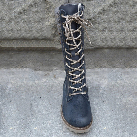 Damenstiefel aus Leder, dunkelblau, mit Schnürung, rutschfeste Sohle, modisch und robust.