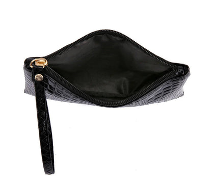 Schwarze Lederhandtasche mit Reißverschluss, Krokodilleder-Optik, Damenmode Accessoire.