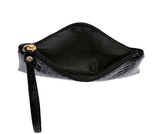 Schwarze Lederhandtasche mit Reißverschluss, Krokodilleder-Optik, Damenmode Accessoire.