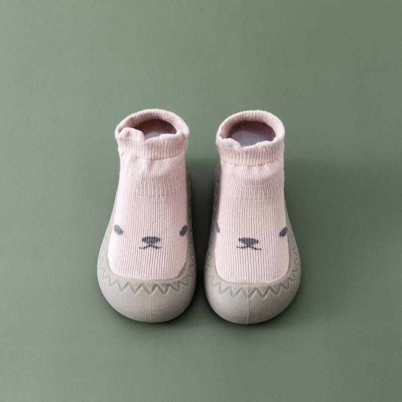 Rosa Babyschuhe mit Tiergesicht, rutschfest, weiche Sohle, ideal für Kleinkinder.