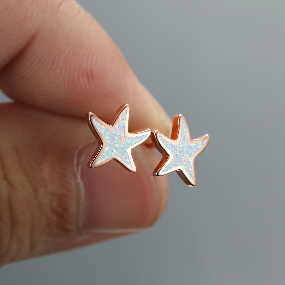 Ohrringe in Sternform, Roségold, Opal-Effekt, Damen-Schmuck, modisch, elegant, Geschenkidee.
