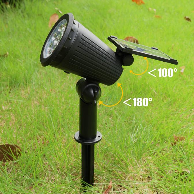 Schwarzer LED-Solarstrahler im Garten, verstellbar, umweltfreundliche Beleuchtung.