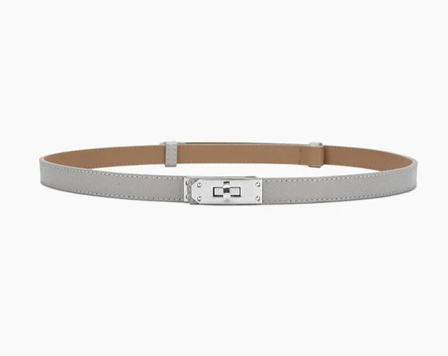 Grauer Ledergürtel mit silberner Schnalle, modisches Accessoire für Damen, elegant und stilvoll.
