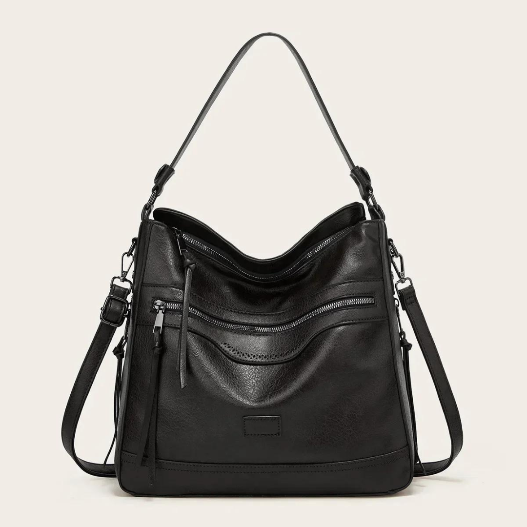 Schwarze Lederhandtasche mit Reißverschlusstaschen, verstellbarem Schulterriemen, elegant.