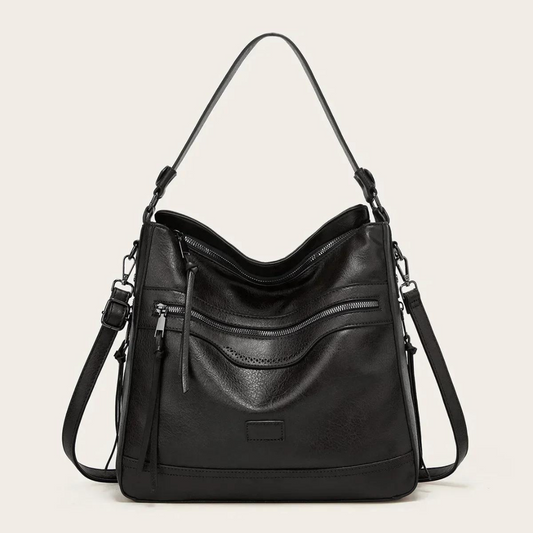 Schwarze Lederhandtasche mit Reißverschlusstaschen, verstellbarem Schulterriemen, elegant.