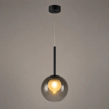 Tänd rökgrå glasklotslampa med svart stav, fotograferad mot en gråbrun bakgrund 10