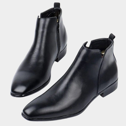 Schwarze Chelsea Boots aus Leder, elegant, für Herren, modisch, rutschfeste Sohle.
