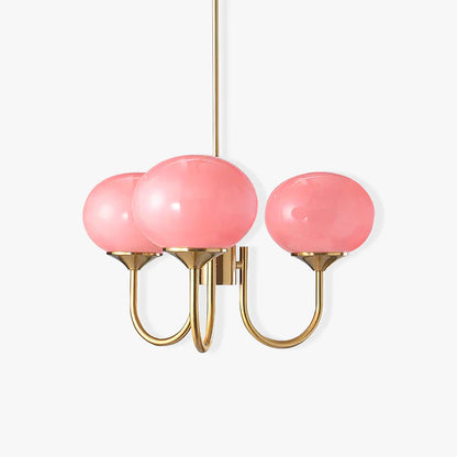 Moderne Deckenleuchte mit drei rosa Glaskugeln und goldenen Metallarmen, elegantes Design.