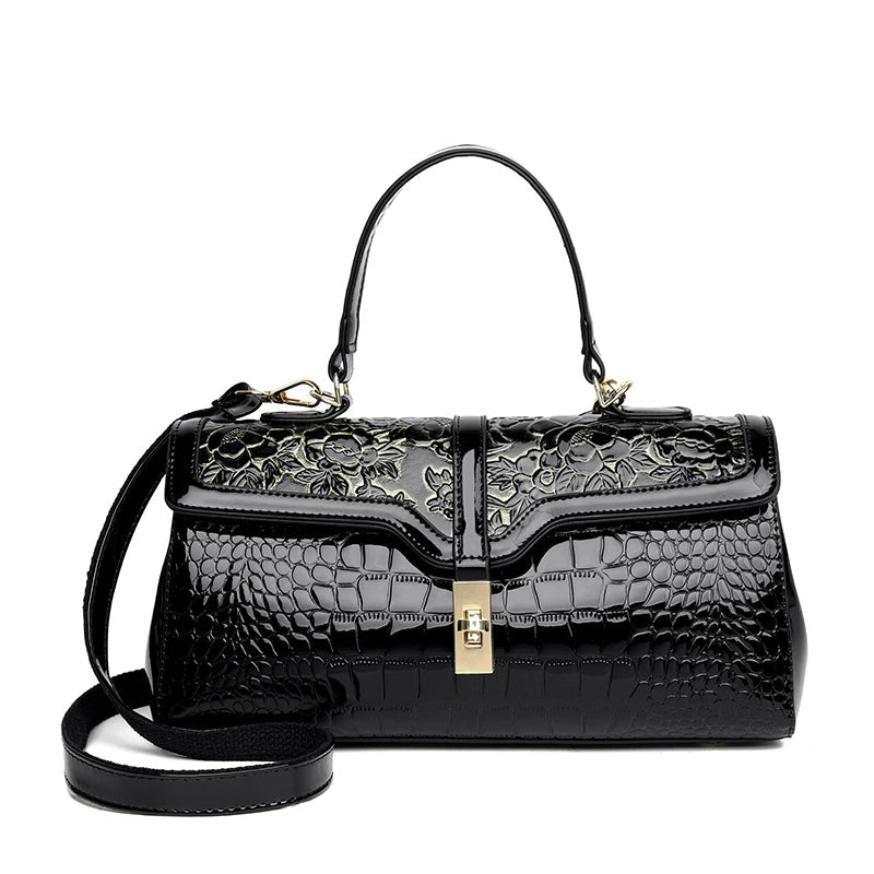 Schwarze Lederhandtasche mit Blumenmuster, Krokodilprägung, goldener Verschluss, Damenmode.